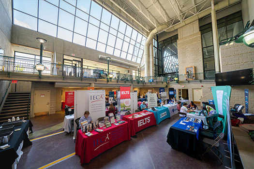 Exhibitor fair in brightly lit atrium