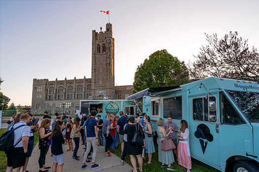 Food truck with crowd outside UC Tower